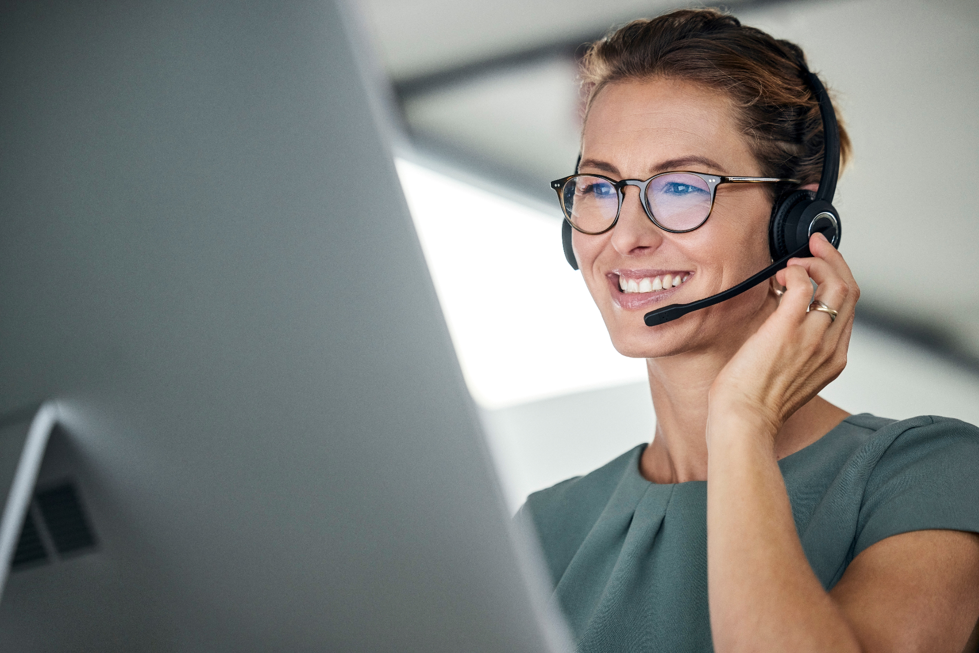 Friendly Dragon Fire Stopping team member taking a customer call